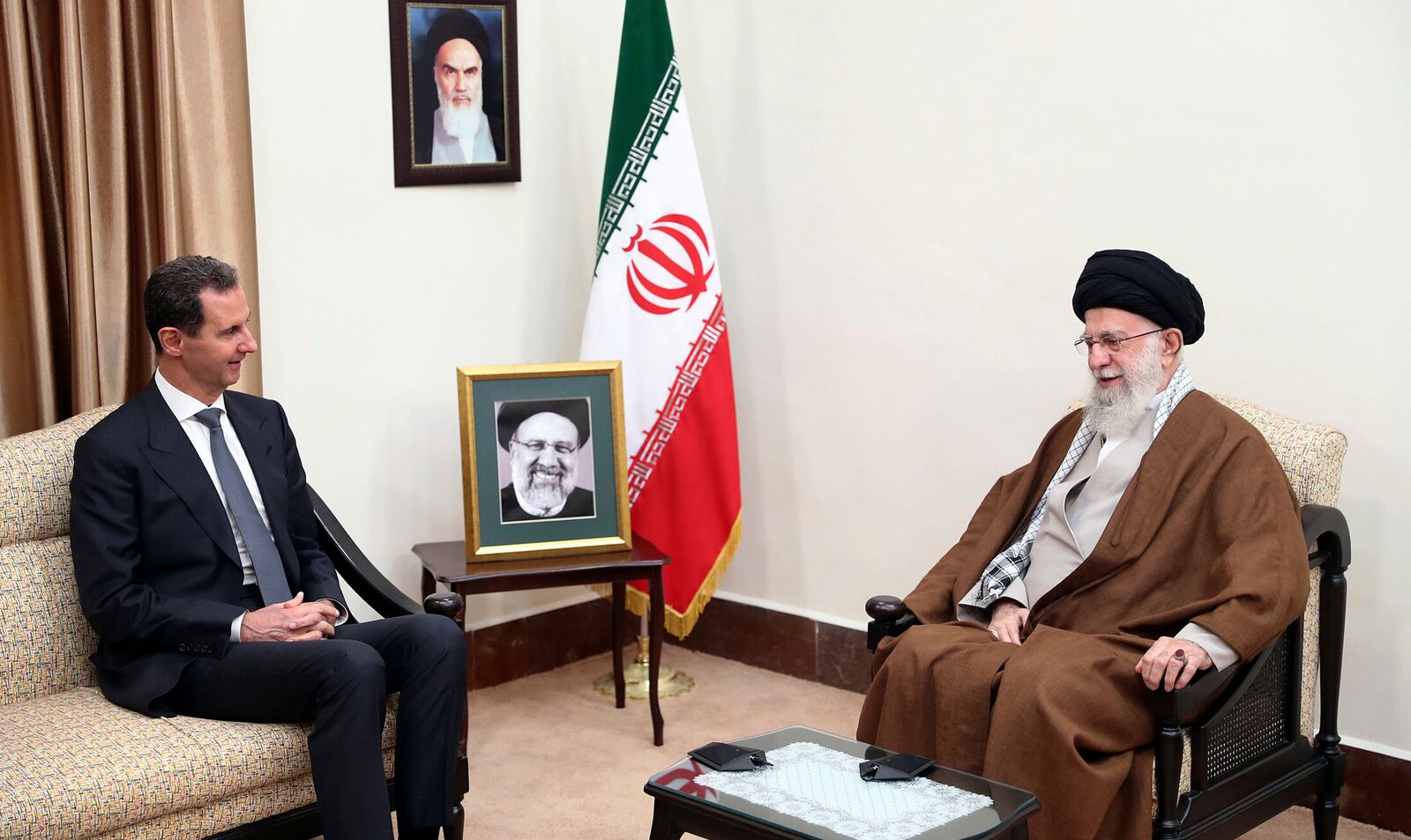 FILE - In this photo released by the official website of the office of the Iranian supreme leader, Supreme Leader Ayatollah Ali Khamenei, right, speaks with Syrian President Bashar Assad in a meeting in Tehran, Iran, May 30, 2024. (Office of the Iranian Supreme Leader via AP, File)