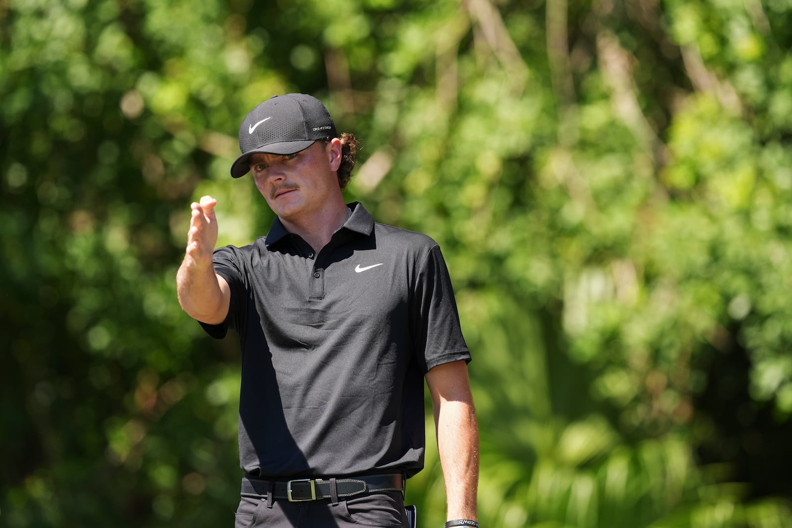 Luke Clanton lines up his tee shot on the third hole during the final round of the Cognizant Classic golf tournament, Sunday, March 2, 2025, in Palm Beach Gardens, Fla. (AP Photo/Rebecca Blackwell)