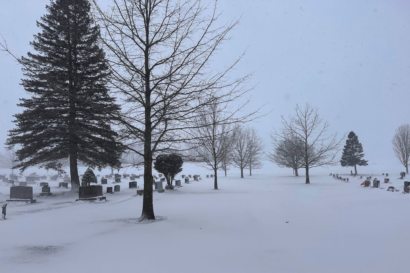 Fresh snow and high winds hit Lowville, N.Y., on Thursday, Dec. 12, 2024, as arts of the U.S. Northeast were in the grip of strong winter weather. (AP Photo/Cara Anna)