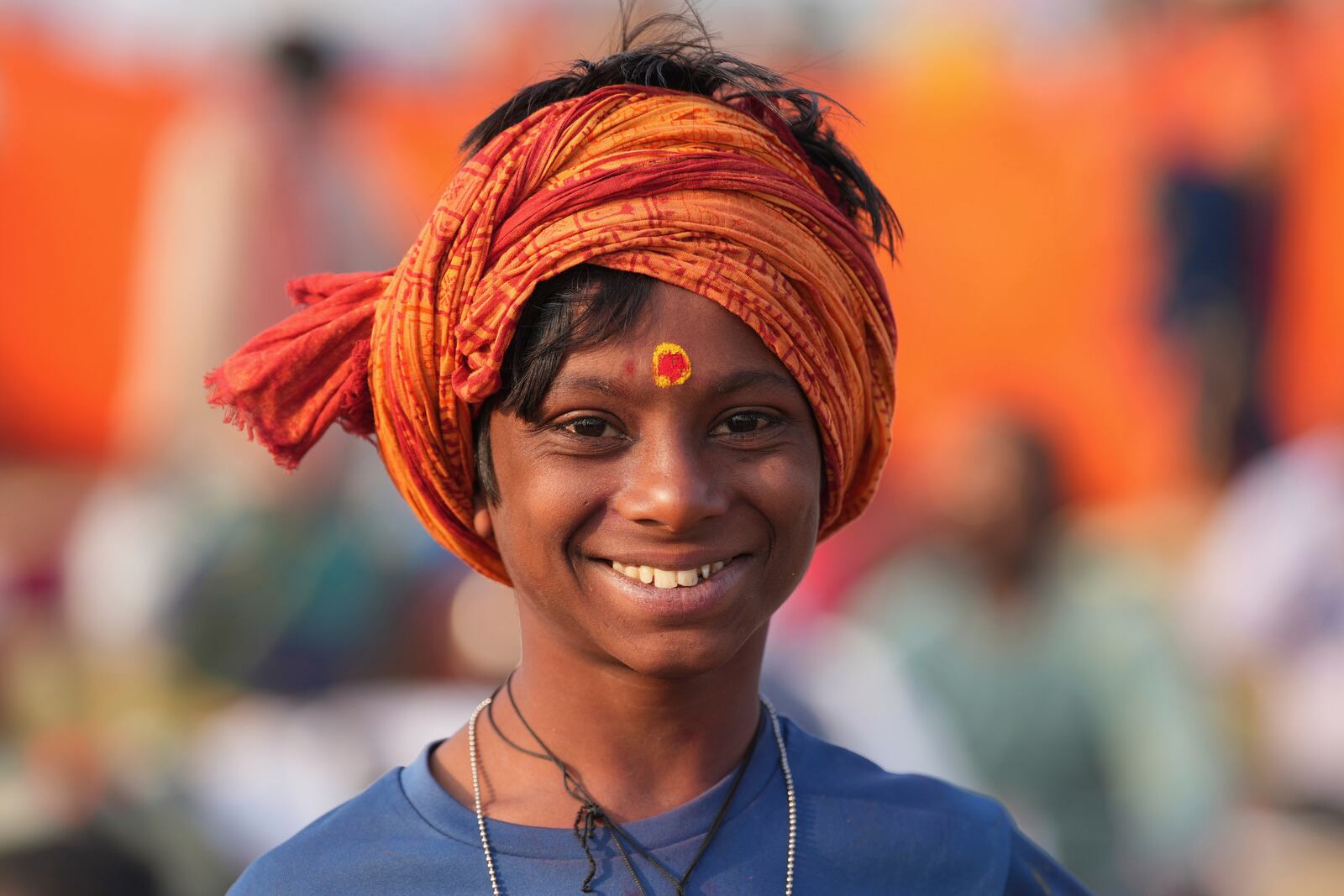 A young Hindu devotee wears a sacred mark on his forehead at the confluence of the Ganges, the Yamuna, and the Saraswati rivers during the 45-day-long Maha Kumbh festival in Prayagraj, India, Tuesday, Jan. 28, 2025. (AP Photo/Deepak Sharma)