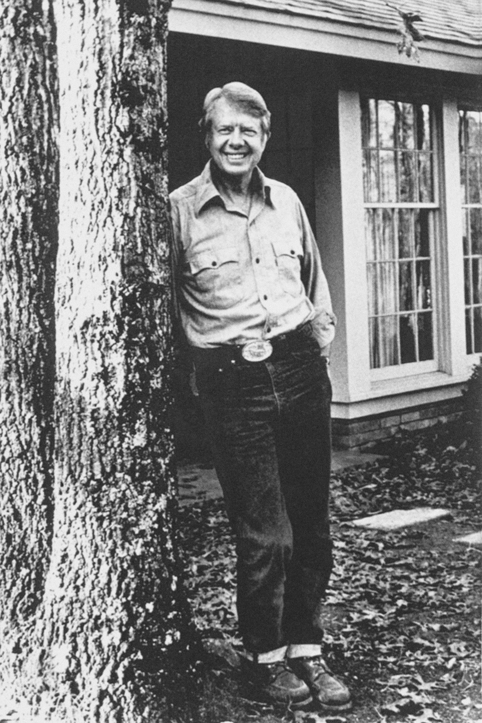 FILE - Former Georgia Gov. Jimmy Carter poses for a picture in blue jeans outside his home in Plains, Ga., Feb. 8, 1976, as he takes a break from campaigning for the Democratic nomination for president. (AP Photo/Joe Holloway Jr., File)