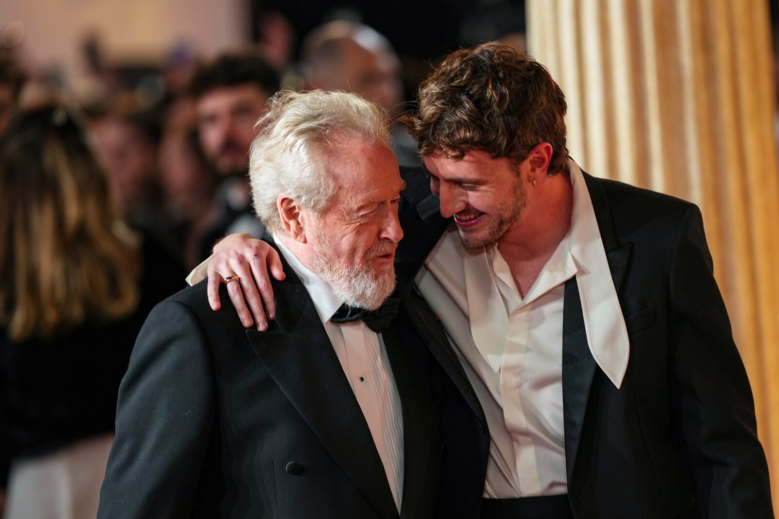 Director Ridley Scott, left, and Paul Mescal pose for photographers upon arrival at the premiere of the film 'Gladiator II' on Wednesday, Nov. 13, 2024, in London. (Photo by Scott A Garfitt/Invision/AP)