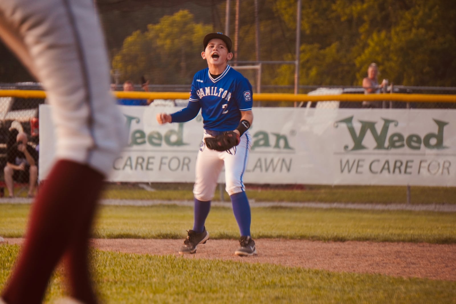 West Side shortstop Jordan Malloy celebrates after West Side made the final out against New Albany to win the Ohio Little League state championship 6-1 on Thursday night at West Side Little League. Chris Vogt/CONTRIBUTED