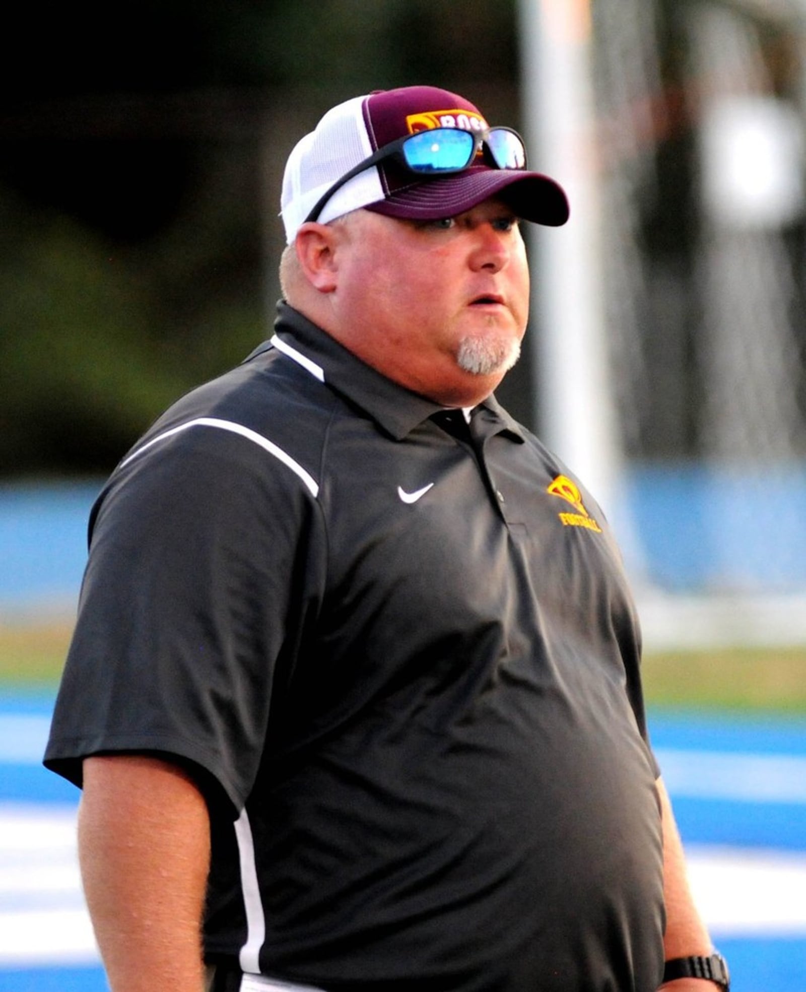 First-year Ross head coach Kenyon Commins watches his team Aug. 25 at Hamilton’s Virgil Schwarm Stadium. The Rams lost that game, their season opener, 36-6 to Badin. NICK GRAHAM/STAFF