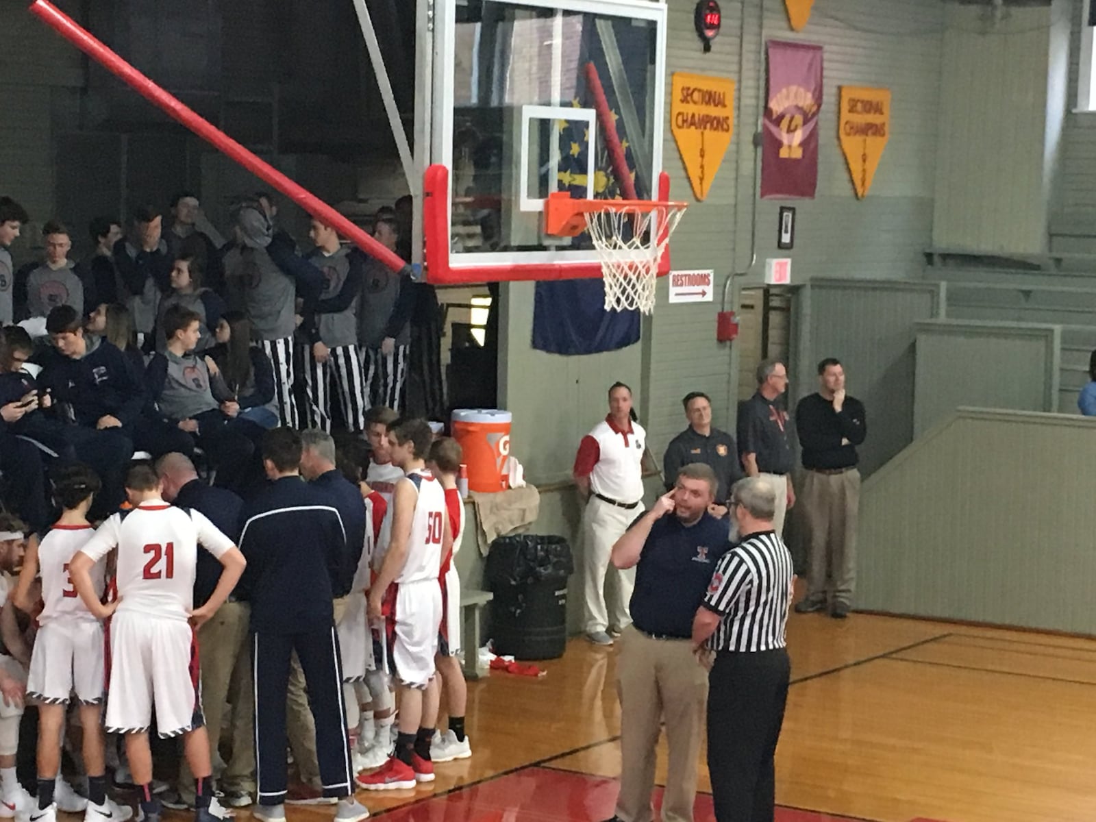 Talawanda assistant coach Jimmy Joe Reed talks to an official during a Braves timeout in Saturday afternoon’s game against Franklin County (Ind.) at the Hoosier Gym in Knightstown, Ind. RICK CASSANO/STAFF