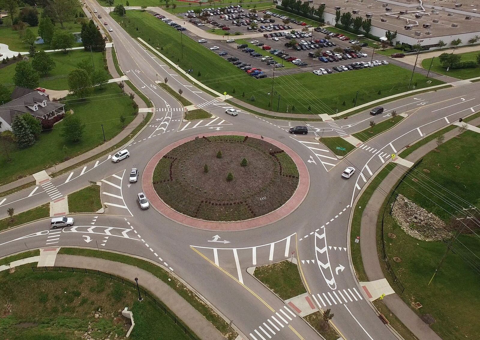 Roundabout intersection of Mason-Montgomery Rd. and Bethany Rd. Warren County plans to spend about $7 million in the next 18 months on roundabouts - rather than traditional intersections with traffic lights - to manage traffic and other safety hazards. The spending is the another example of the growing popularity on road construction designed to angle merging drivers into the circular roadways to keep traffic moving, rather than stacked up in lines waiting for the green light. TY GREENLEES / STAFF