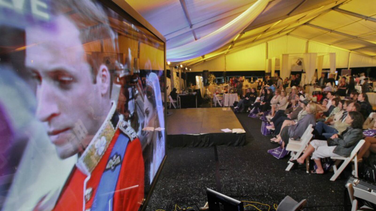 Prince William and Kate Middleton become man and wife in April 2011 while a crowd in Atlanta’s Piedmont Park watches the live broadcast on large screen televisions.