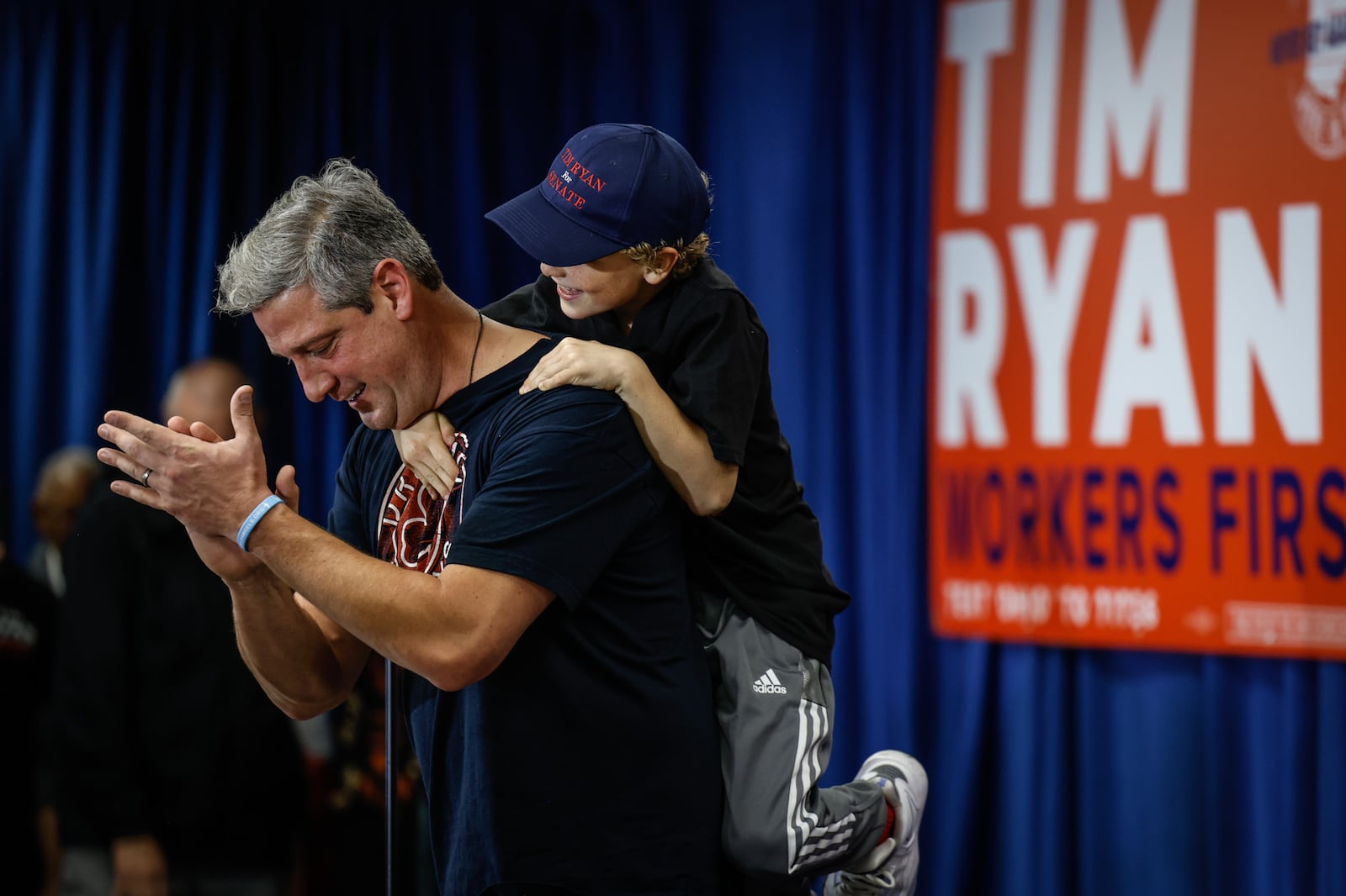 Ohio senatorial candidate Tim Ryan and his son, Brady Ryan play around at the International Brotherhood of Electrical Workers Local on Poe Ave. Thursday November 3, 2022 after Tim’s speech. Ryan took the stage too late for today’s newspaper. Look for a full report on the rally in Saturday’s Dayton Daily News, your ePaper or http://DaytonDailyNews.com. Also look for upcoming coverage of former President Donald Trump’s visit to Vandalia on Monday to campaign for Republican candidate J.D. Vance. We are covering both rallies as part of our commitment to fairness in election coverage. Jim Noelker/Staff