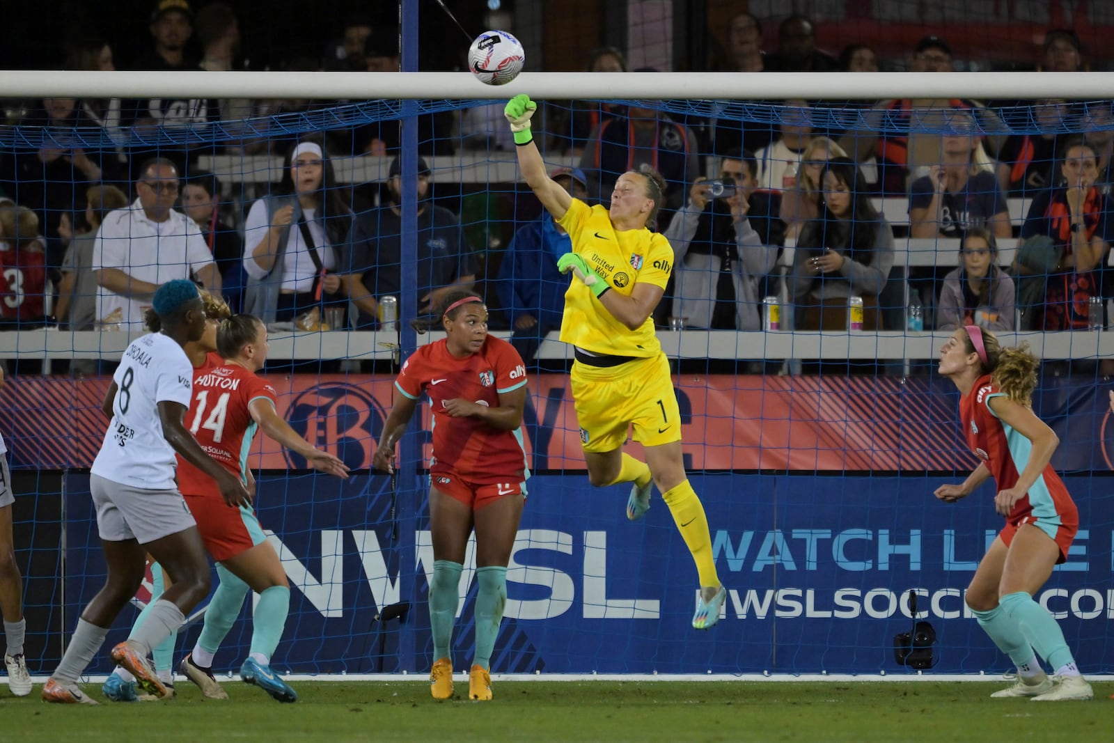 Kansas City Current goalkeeper Almuth Schult (1) punches away a ball during the first half of an NWSL soccer match against Bay FC in San Jose, Calif., on Saturday, Oct. 12, 2024. (Jose Carlos Fajardo/Bay Area News Group via AP)