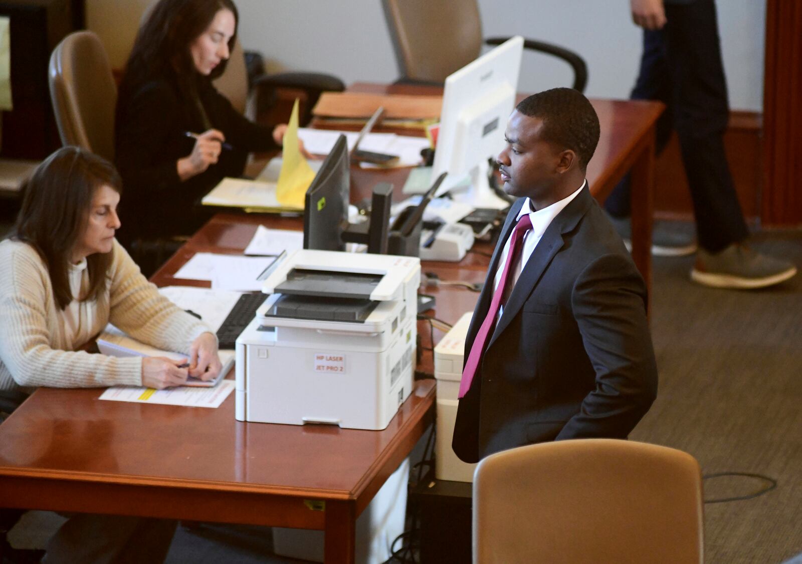 Sheldon Timothy Herrington Jr., who is on trial on a capital murder charge in the 2022 death of University of Mississippi student Jimmie "Jay" Lee, looks out into the courtroom during the lunch break, in Oxford, Miss., on Tuesday, Dec. 3, 2024. (Bruce Newman/The Northeast Mississippi Daily Journal via AP, Pool)