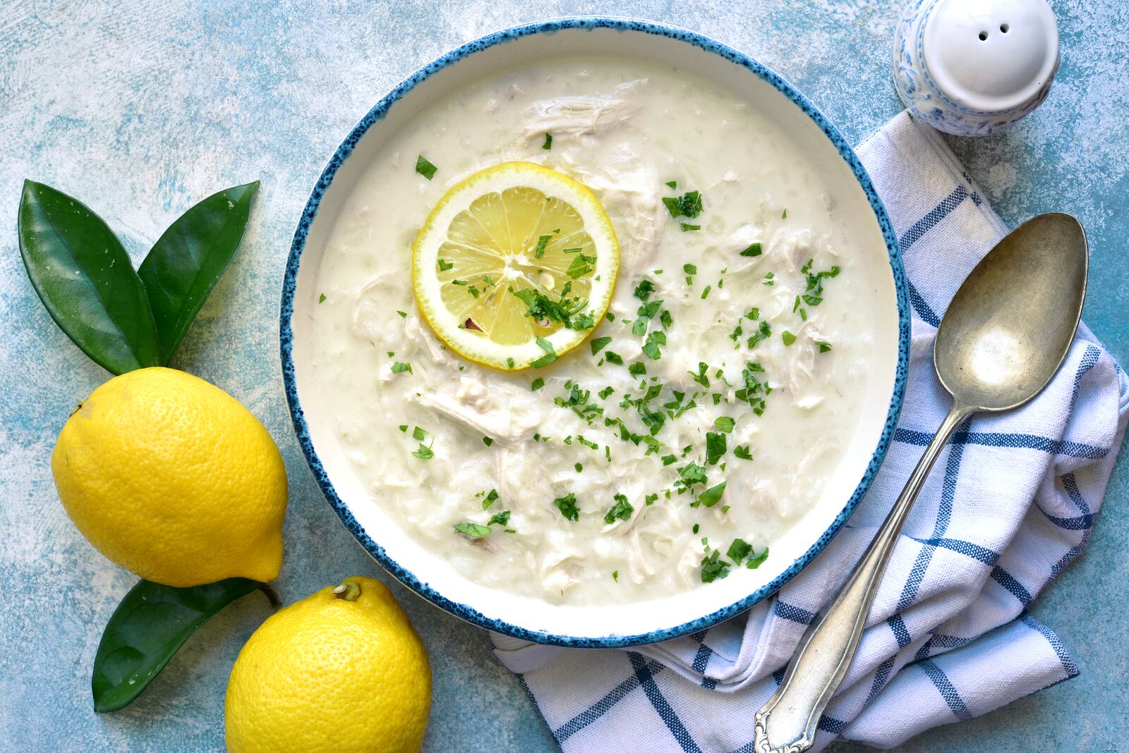 Avgolemono is a traditional Greek chicken soup with orzo pasta, eggs and lemon.