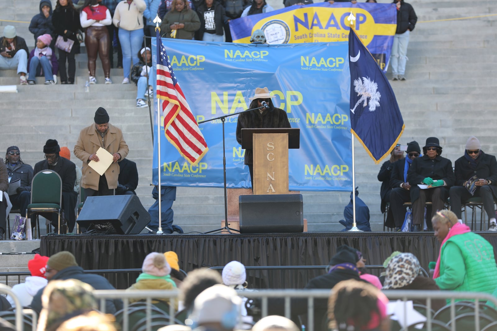 Barbara Johnson -Williams, a vice president of the South Carolina NAACP, speaks at a rally at the Statehouse to honor Martin Luther King Jr. on his holiday on Monday, Jan. 20, 2025, in Columbia, S.C. (AP Photo/Jeffrey Collins)