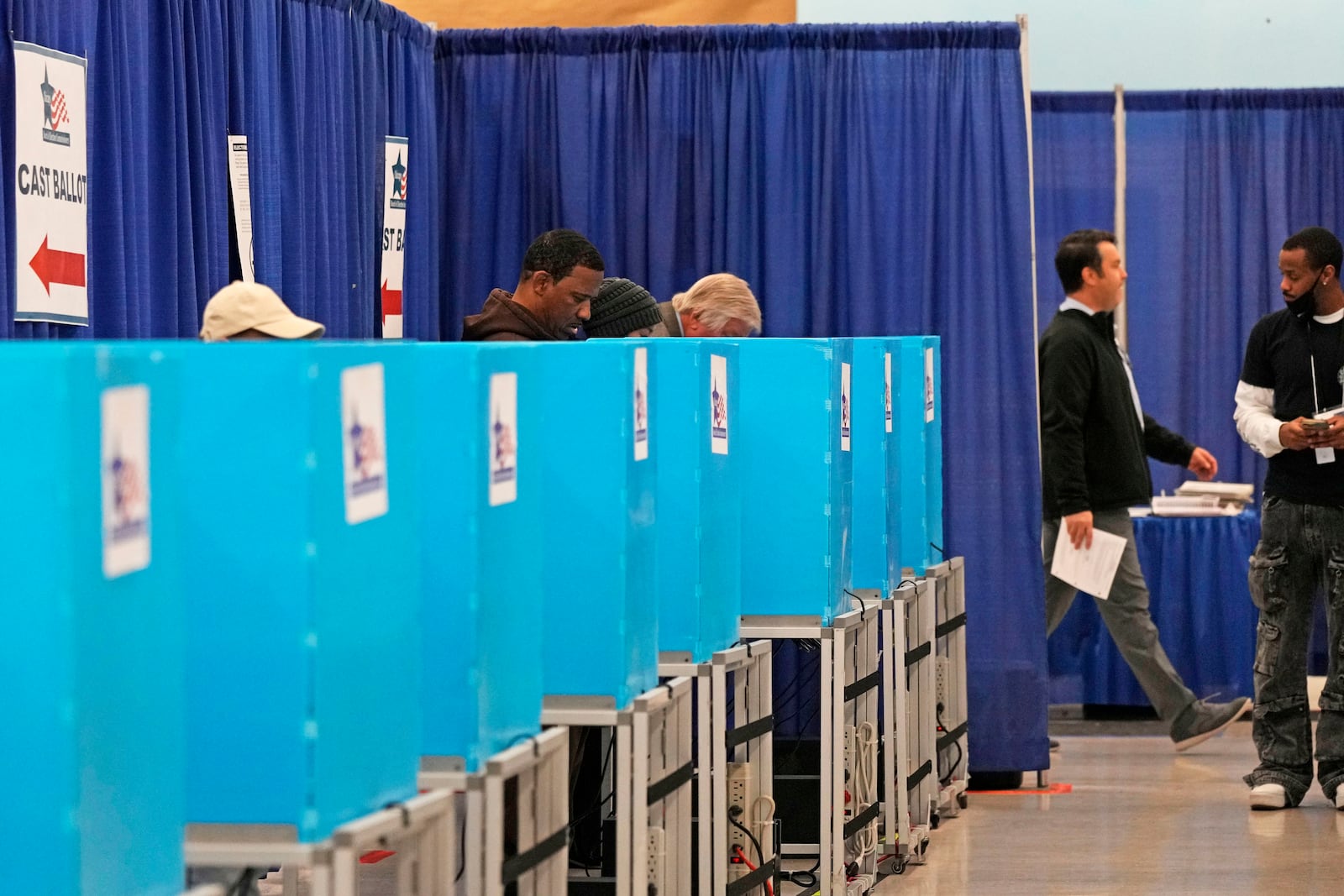 Voters cast ballots at the Chicago Early Voting Loop Supersite in Chicago, Thursday, Oct. 24, 2024. (AP Photo/Nam Y. Huh)