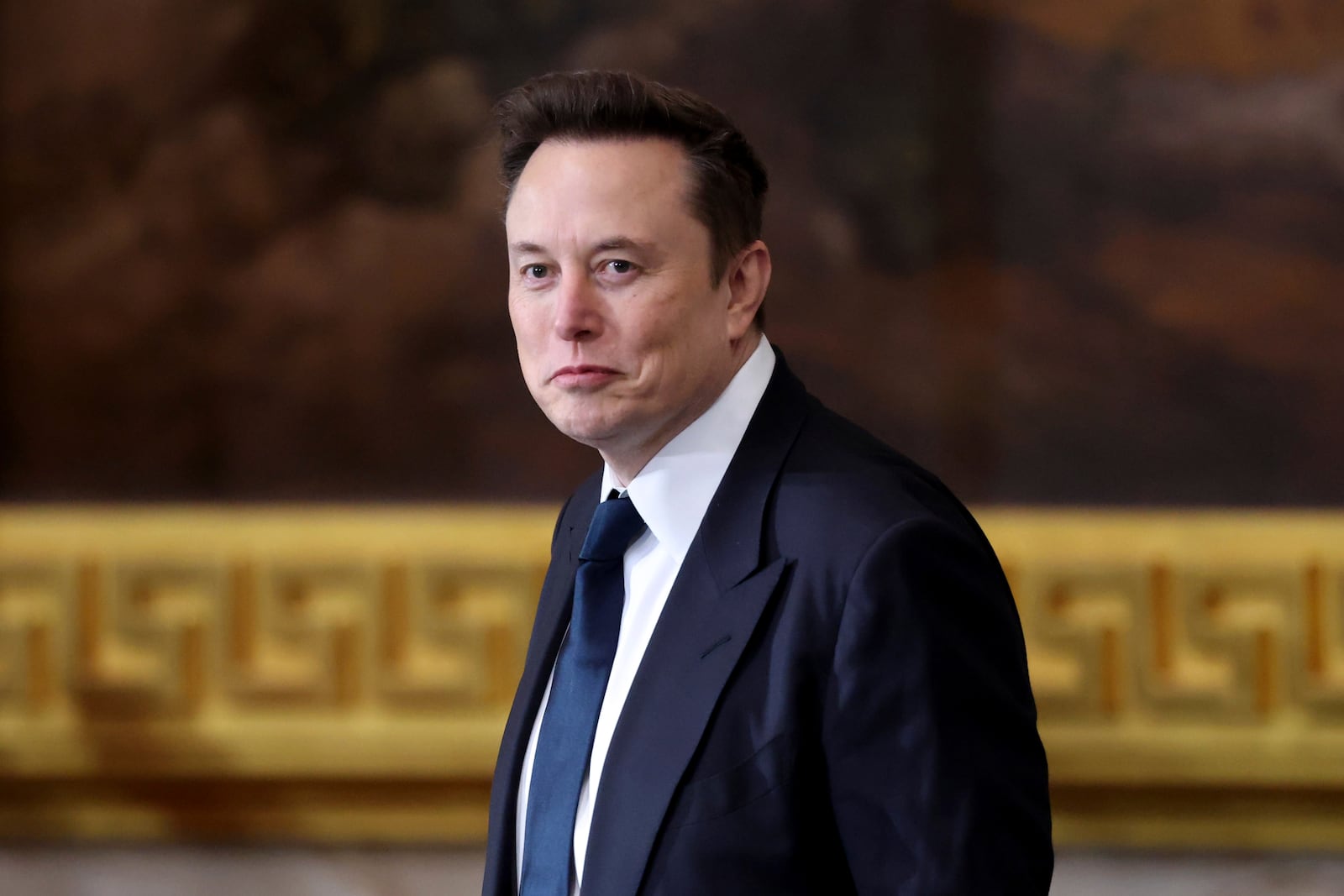 Elon Musk arrives before the 60th Presidential Inauguration in the Rotunda of the U.S. Capitol in Washington, Monday, Jan. 20, 2025. (Kevin Lamarque/Pool Photo via AP)