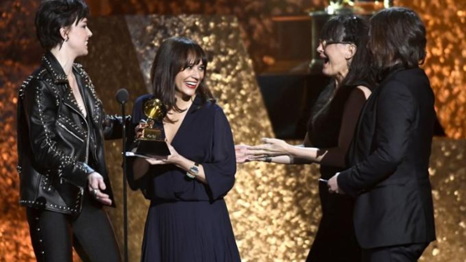 Rashida Jones (left), Alan Hicks and Paula DuPré Pesmen accept Best Music Film for 'Quincy' at the premiere ceremony during the 61st annual Grammy Awards at Staples Center on Feb. 10, 2019, in Los Angeles.