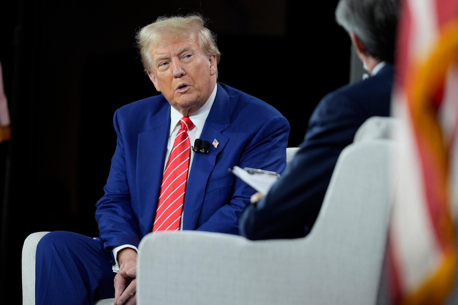 Republican presidential nominee former President Donald Trump speaks during an interview with Bloomberg News Editor-in-Chief John Micklethwait during an event with the Economic Club of Chicago, Tuesday, Oct. 15, 2024, in Chicago. (AP Photo/Evan Vucci)