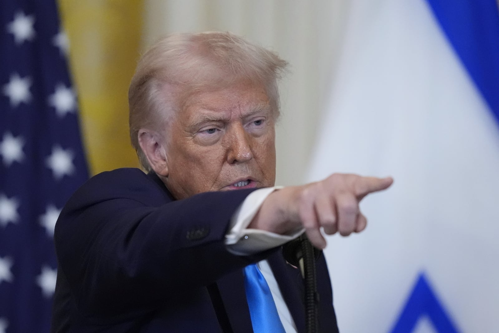 President Donald Trump and Israeli Prime Minister Benjamin Netanyahu take questions during a news conference in the East Room of the White House, Tuesday, Feb. 4, 2025, in Washington. (AP Photo/Alex Brandon)