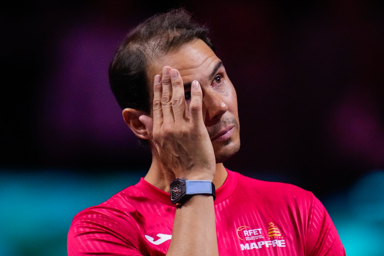 Spain's Rafael Nadal during a tribute after playing his last match as a professional tennis player in the Davis Cup quarterfinals at the Martin Carpena Sports Hall in Malaga, southern Spain, on early Wednesday, Nov. 20, 2024. (AP Photo/Manu Fernandez)