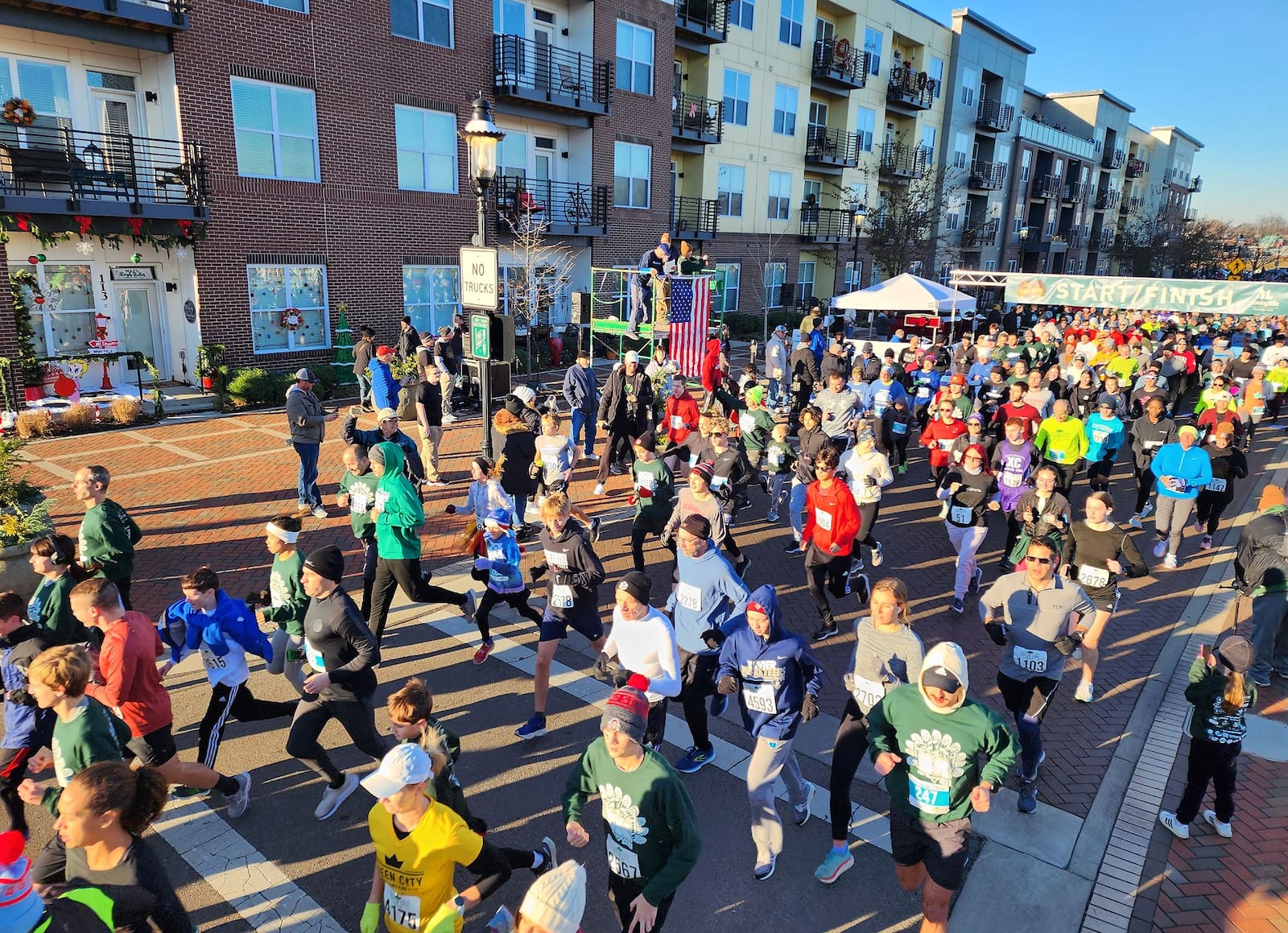 The Meyer Brothers and Sons Thanksgiving Day 5k for Young Lives was held Thursday, Nov. 24, 2022 in Hamilton. Thousands of runners, walkers and volunteers filled Marcum Park and downtown streets for the event. NICK GRAHAM/STAFF