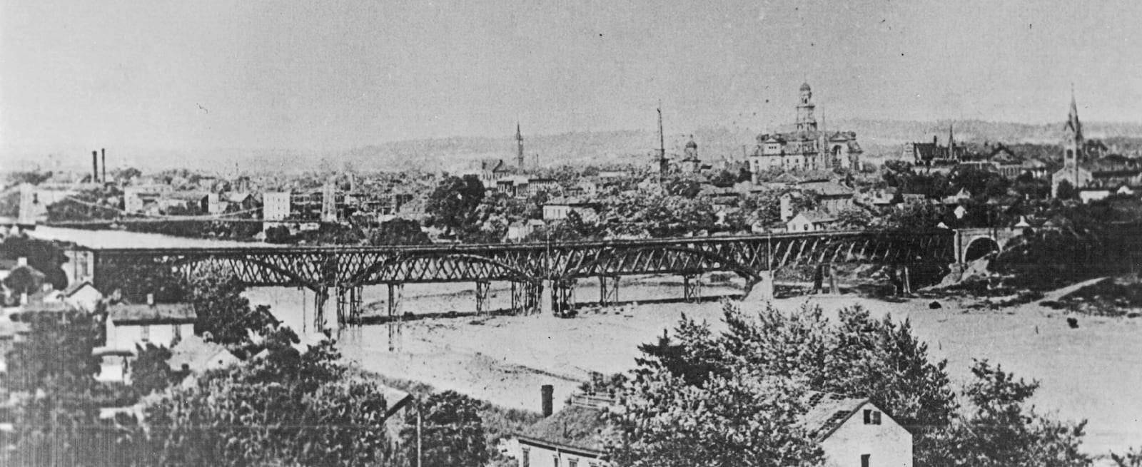 In 1893, the 1858 original bridge was replaced by one made of iron and would be destroyed in the 1913 Flood. Photo courtesy of Dan Finfrock