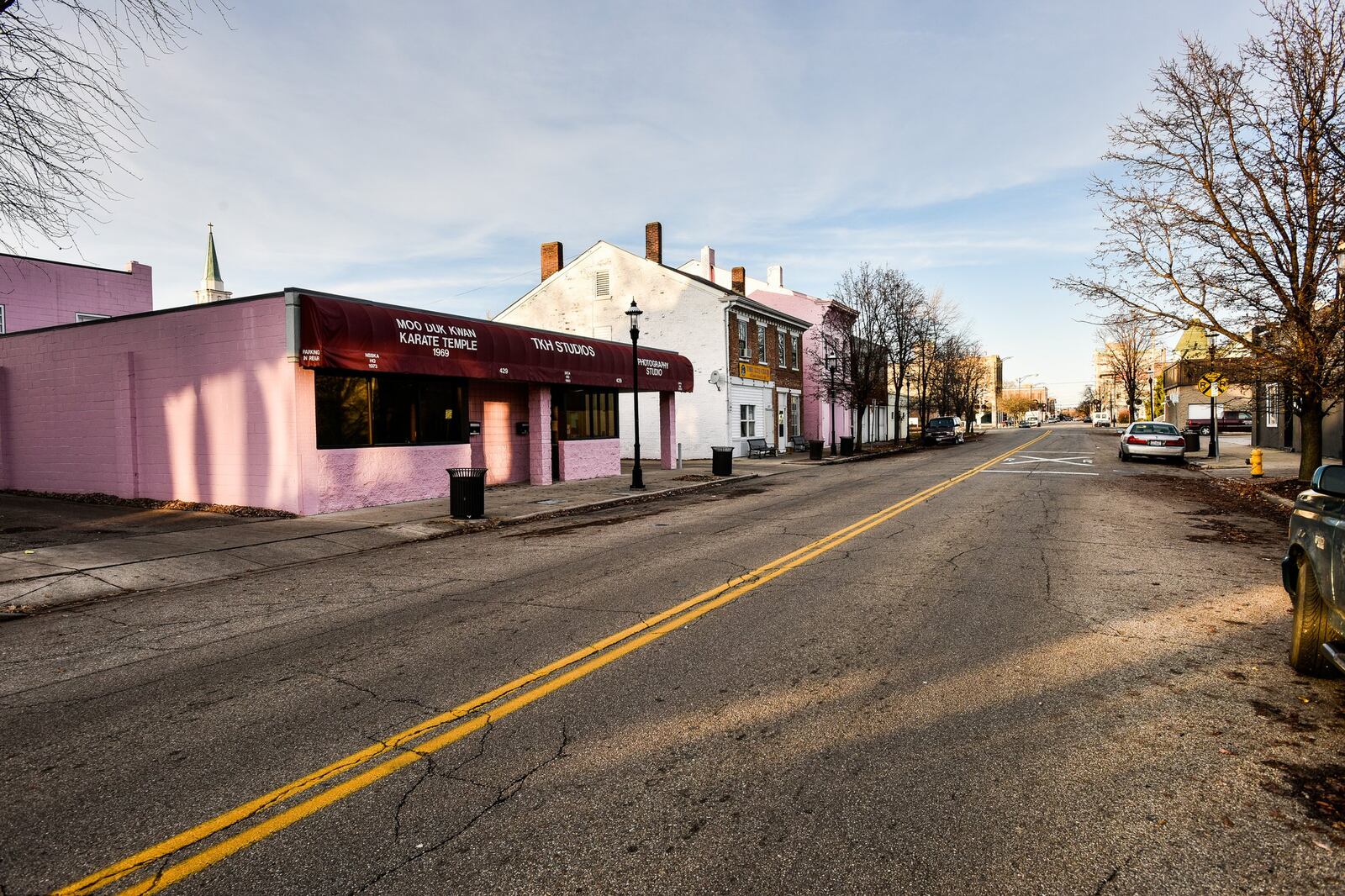 Miami University students will create an economic-development for Hamilton’s impoverished Second Ward, where residents have urged the city for help fostering businesses in their neighborhood. Here, usinesses line South Second Street in Hamilton. NICK GRAHAM/STAFF