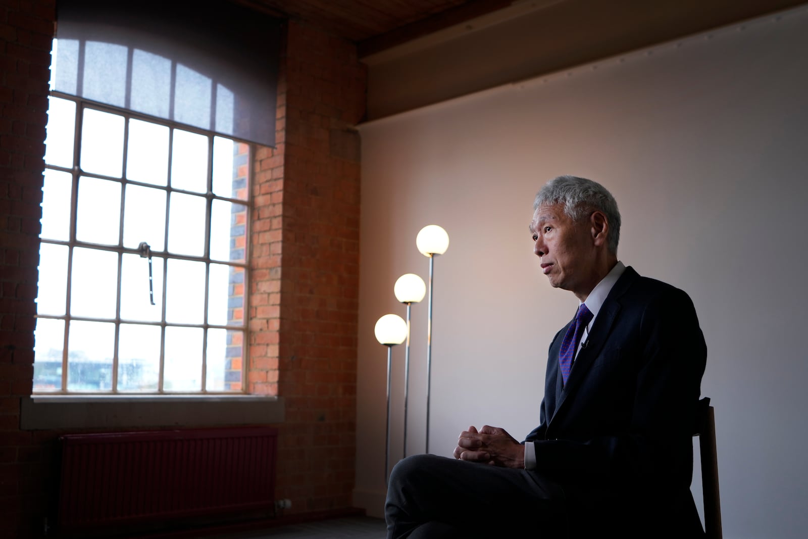 Lee Hsien Yang, who has been granted political asylum in the UK from what he called persecution in Singapore, as he is interviewed by Associated Press in London, Monday, Oct. 28, 2024. (AP Photo/Kirsty Wigglesworth)