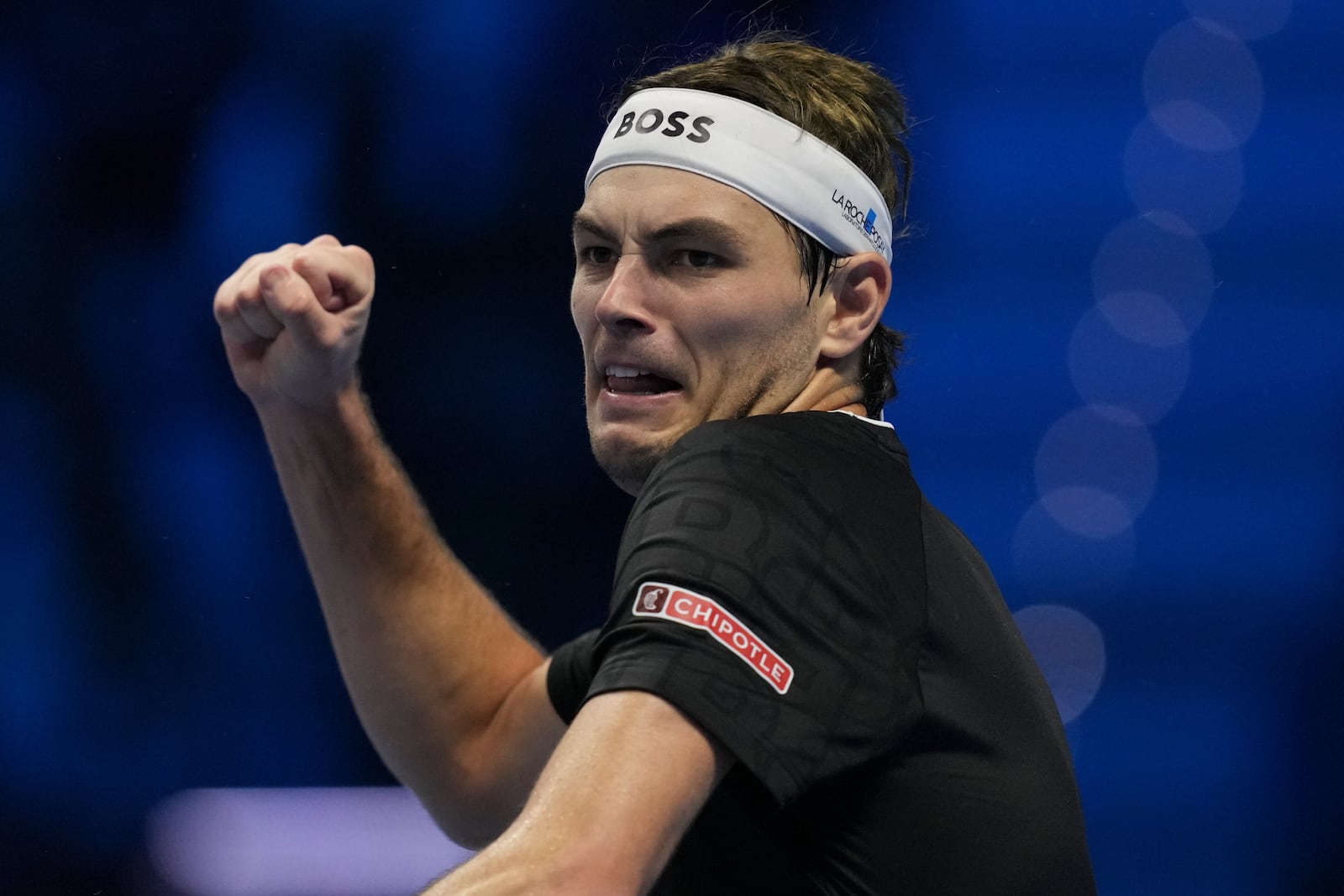 Taylor Fritz of the United States celebrates after winning the ATP World Tour Finals semifinal tennis match against Germany's Alexander Zverevat at the Inalpi Arena in Turin, Italy, Saturday, November 16, 2024. (AP Photo/Antonio Calanni)