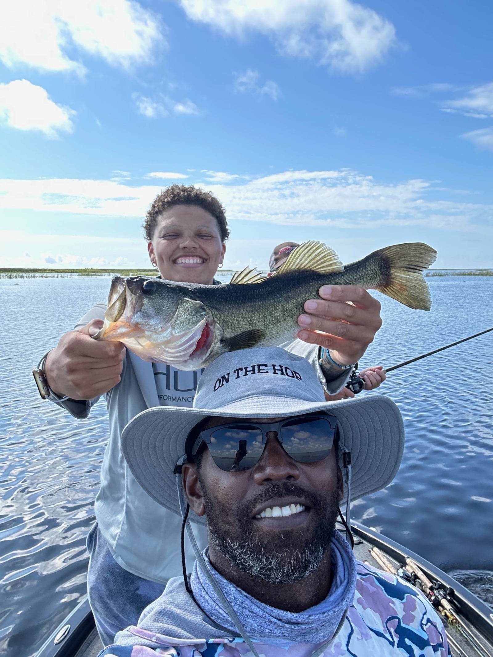 Randy Moss may have ended up one of the greatest receivers the NFL has ever known but he’s not the only one in the family who can catch. Like her father Sydney Moss, is an avid bass fisherman and in this outing with her dad, she holds up her catch.  She has started a bass fishing club at Wilmington College. . (Contributed Photo)