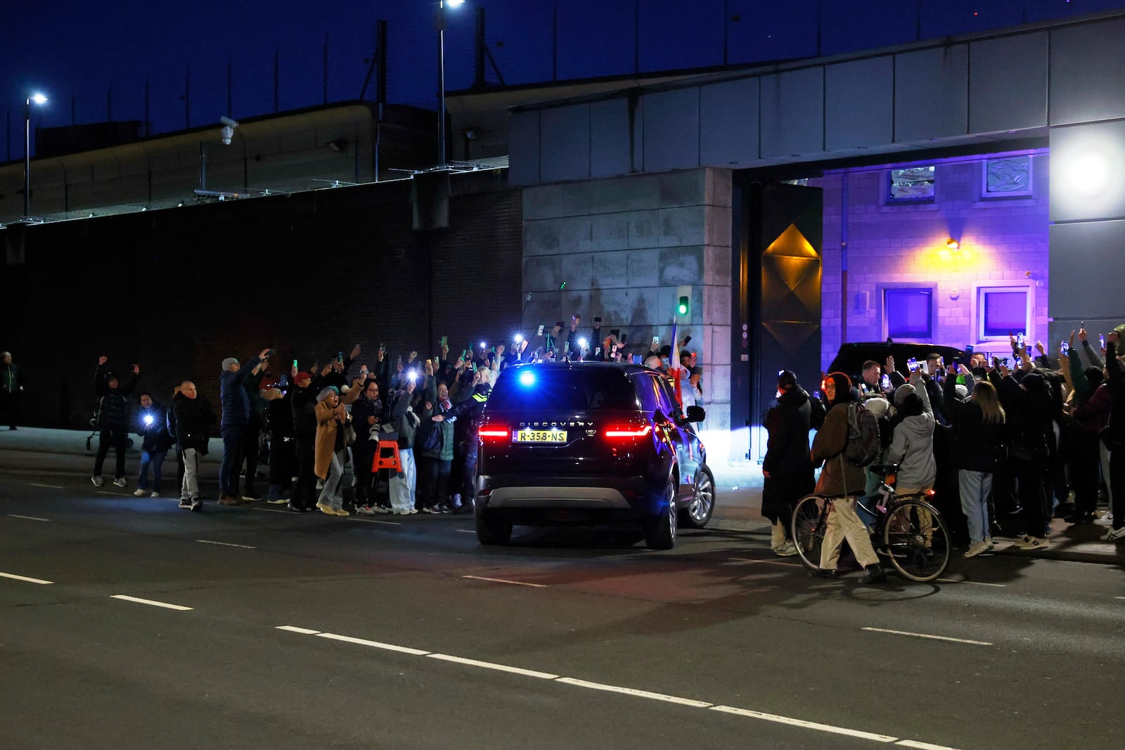 A motorcade believed to be carrying former Philippine President Rodrigo Duterte arrives at the International Criminal Court detention center near The Hague in Scheveningen, Netherlands, Wednesday, March 12, 2025. (AP Photo/Omar Havana)