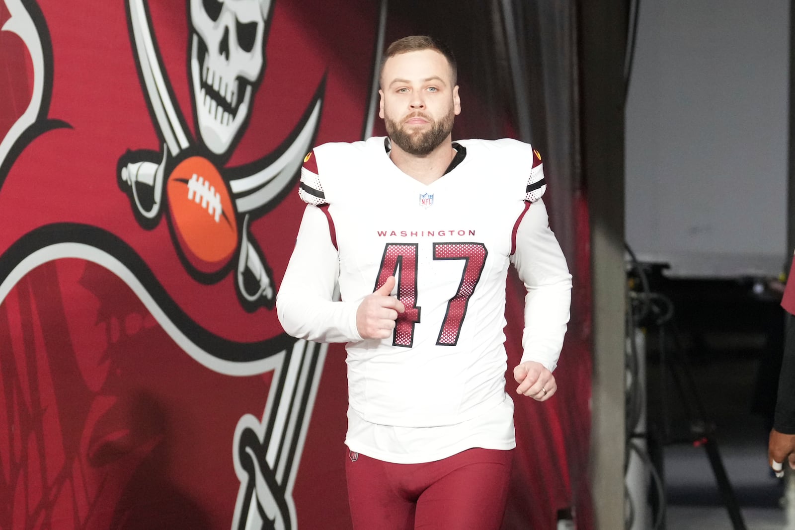 FILE - Washington Commanders place kicker Zane Gonzalez (47) enters the field after half time an NFL football Wild Card playoff game against the Tampa Bay Buccaneers, Jan 12, 2025, in Tampa, Fla. (AP Photo/Peter Joneleit, File)