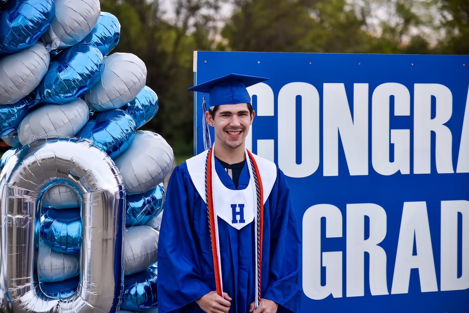 Hamilton High School seniors celebrate graduation at Holiday Auto Theatre drive-in