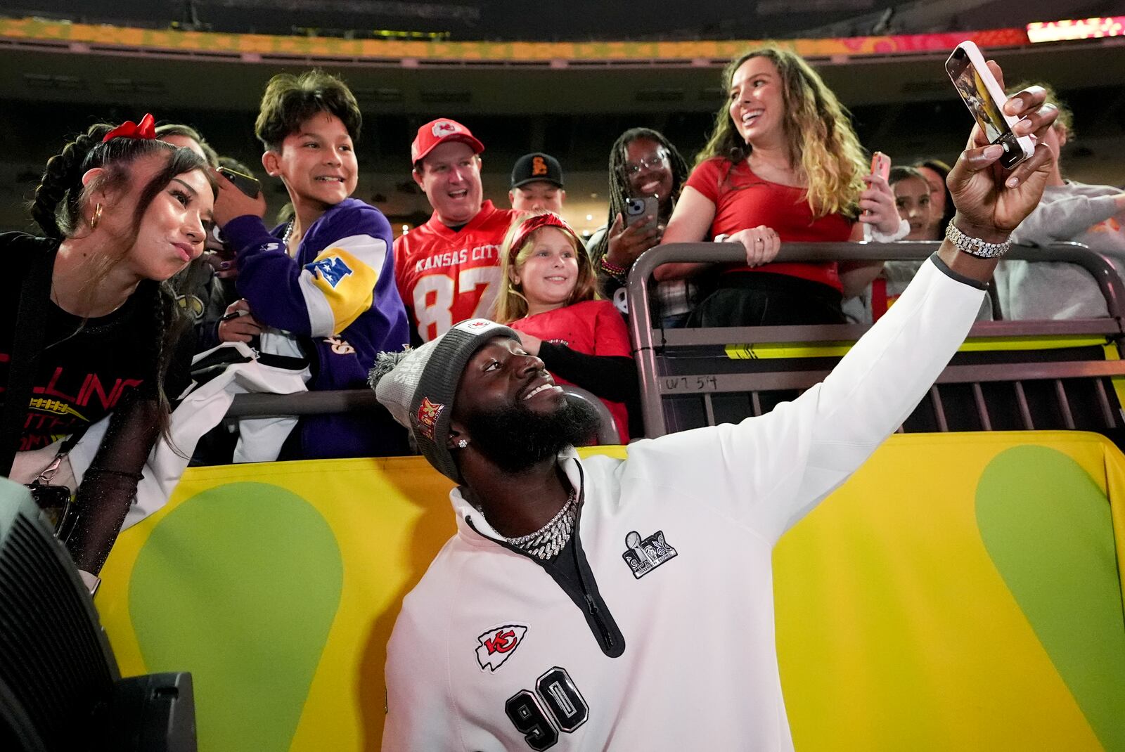 Kansas City Chiefs defensive end Charles Omenihu (90) participates during Super Bowl 59 Opening Night, Monday, Feb. 3, 2025, in New Orleans, ahead of the NFL football game between the Philadelphia Eagles and the Kansas City Chiefs Sunday. (AP Photo/Brynn Anderson )