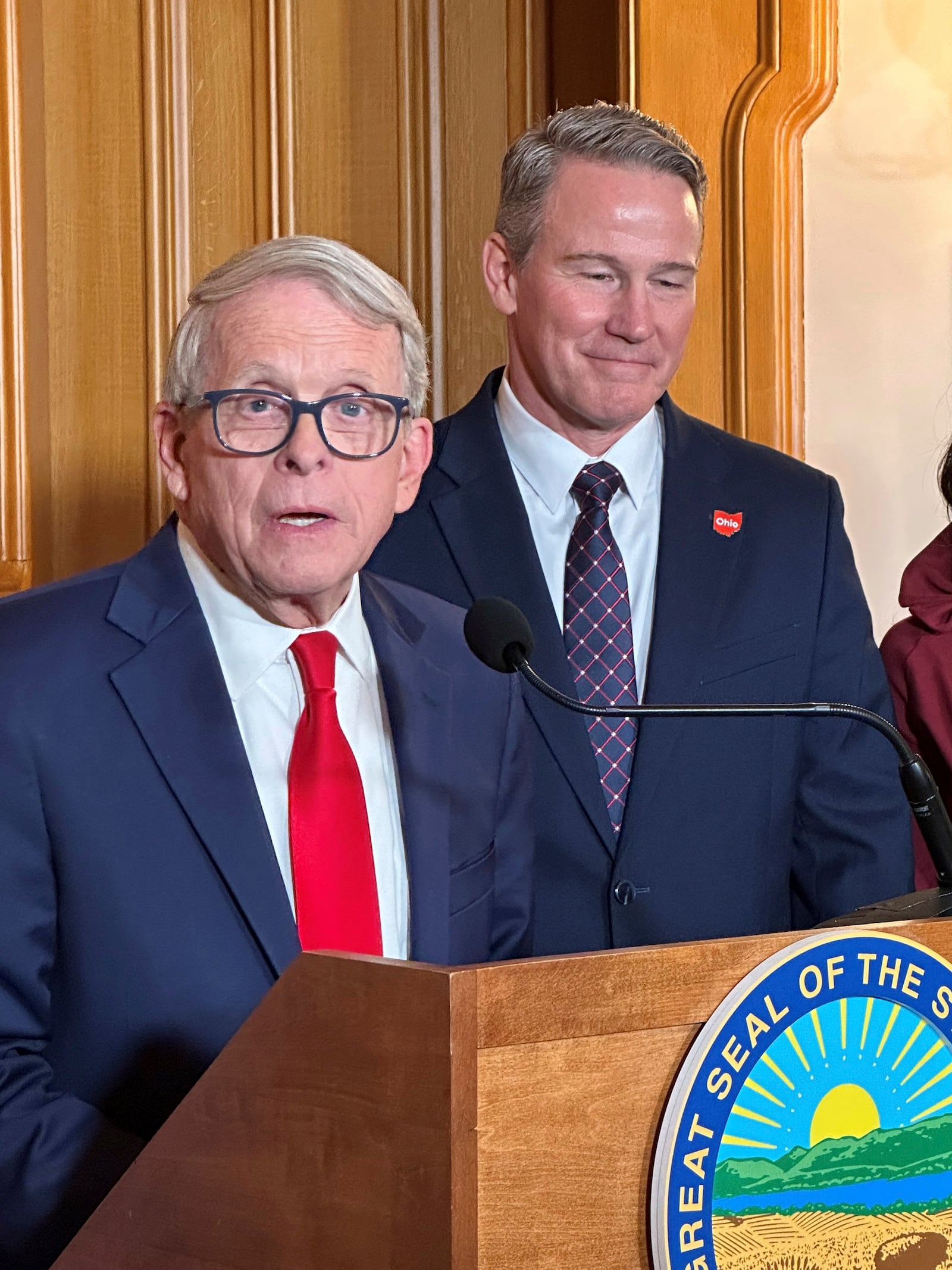 Republican Ohio Gov. Mike DeWine speaks at a news conference on Friday, Jan. 17, 2025, in Columbus, Ohio, announcing his appointment of Lt. Gov. Jon Husted, right, to fill the U.S. Senate seat formerly held by Vice President-elect JD Vance. (AP Photo/Julie Carr Smyth)