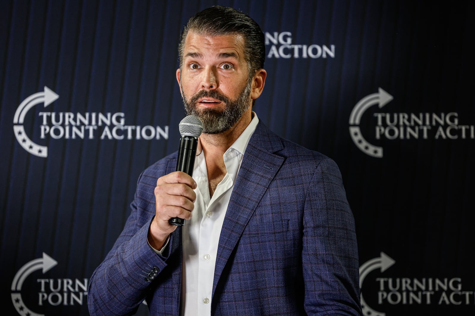 Donald Trump Jr. speaks during a town hall meeting Monday, March 17, 2025, in Oconomowoc, Wis. (AP Photo/Jeffrey Phelps)