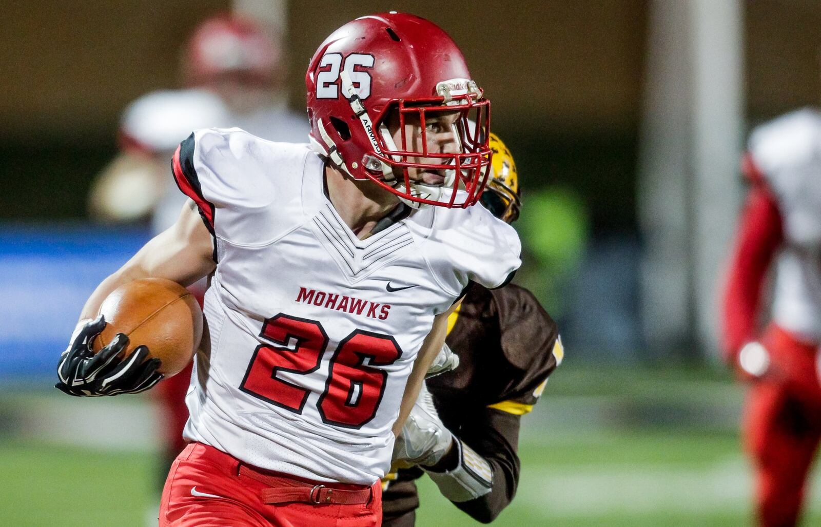 Madison’s Cameron Svarda carries the ball during last Friday’s 42-7 win over West Jefferson in the Division V, Region 20 championship game at Beavercreek. NICK GRAHAM/STAFF