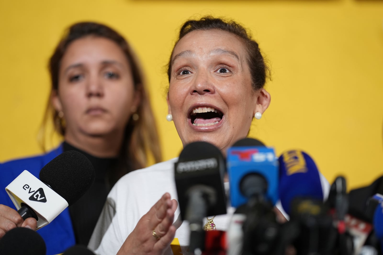 Adelys Ferro, executive director of grassroots organization the Venezuelan American Caucus, speaks during a press conference by Venezuelan community leaders to denounce an end to the protections that shielded hundreds of thousands of Venezuelans from deportation, Monday, Feb. 3, 2025, in Doral, Fla. (AP Photo/Rebecca Blackwell)