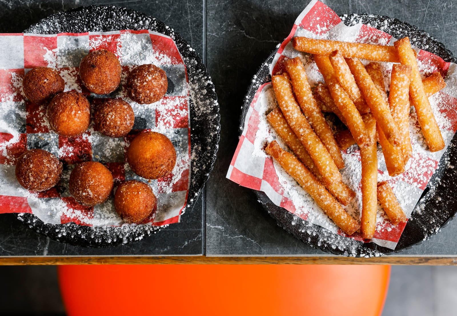 Love Me Tenders has opened on Ohio 4 in Liberty Township. This is their vanilla donut holes and funnel cake fries sprinkled with powdered sugar and cinnamon. The restaurant features fresh hand-breaded chicken tenders with a variety of sauces for dipping, wraps, chicken sandwiches, fries, saratoga chips, garlic toast, coleslaw and more. NICK GRAHAM/STAFF