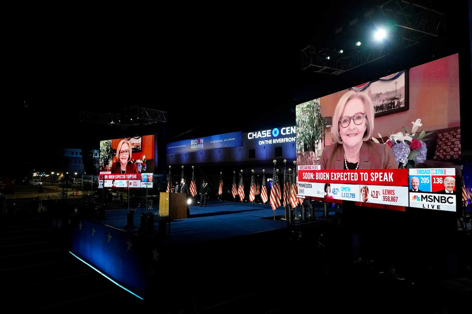 FILE - MSNBC election coverage is displayed on screen as supporters wait for Democratic presidential candidate former Vice President Joe Biden to speak early Nov. 4, 2020, in Wilmington, Del. (AP Photo/Andrew Harnik, File)