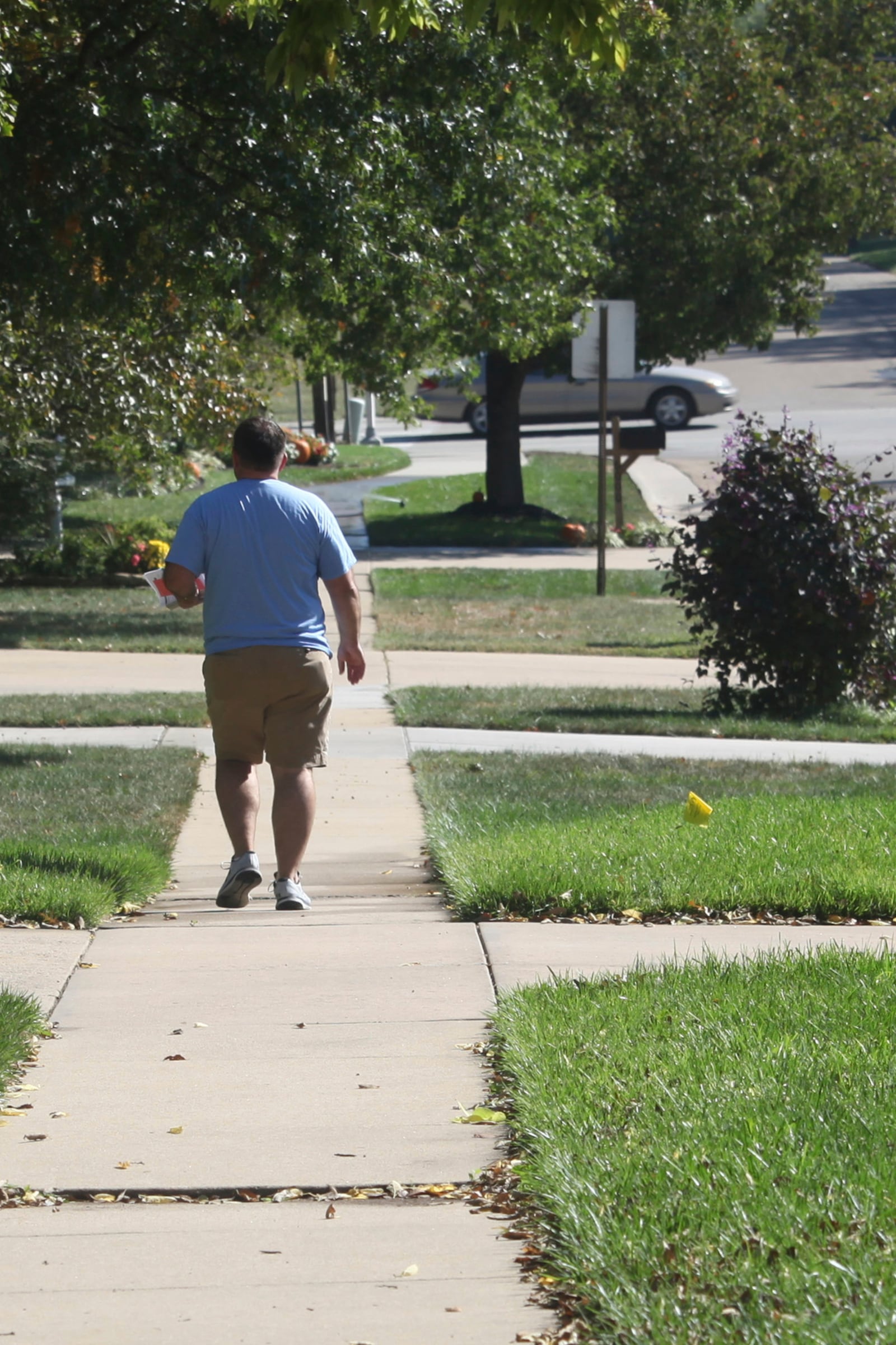 Kansas state Rep. Jesse Borjon, R-Topeka, campaigns door to door for reelection, Saturday, Oct. 5, 2024, in Topeka, Kansas. (AP Photo/John Hanna