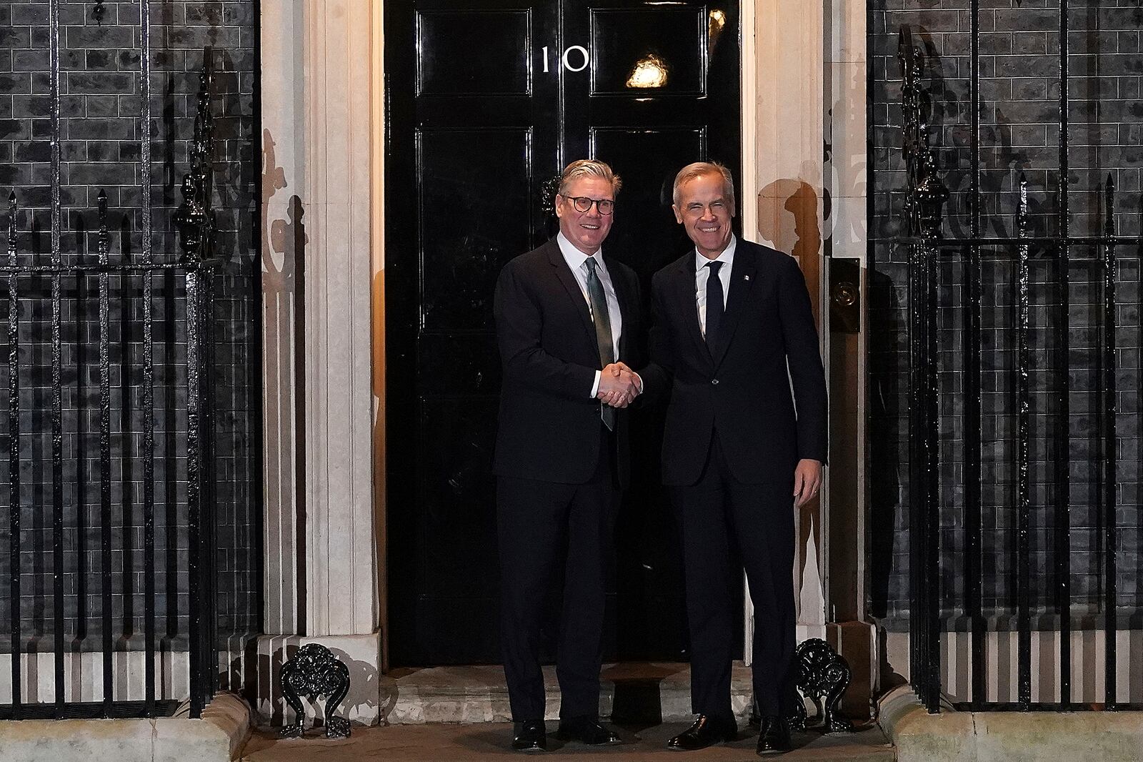 Britain's Prime Minister Keir Starmer welcomes Canada's Prime Minister Mark Carney to 10 Downing Street in London, Monday, March 17, 2025.(AP Photo/Alberto Pezzali)