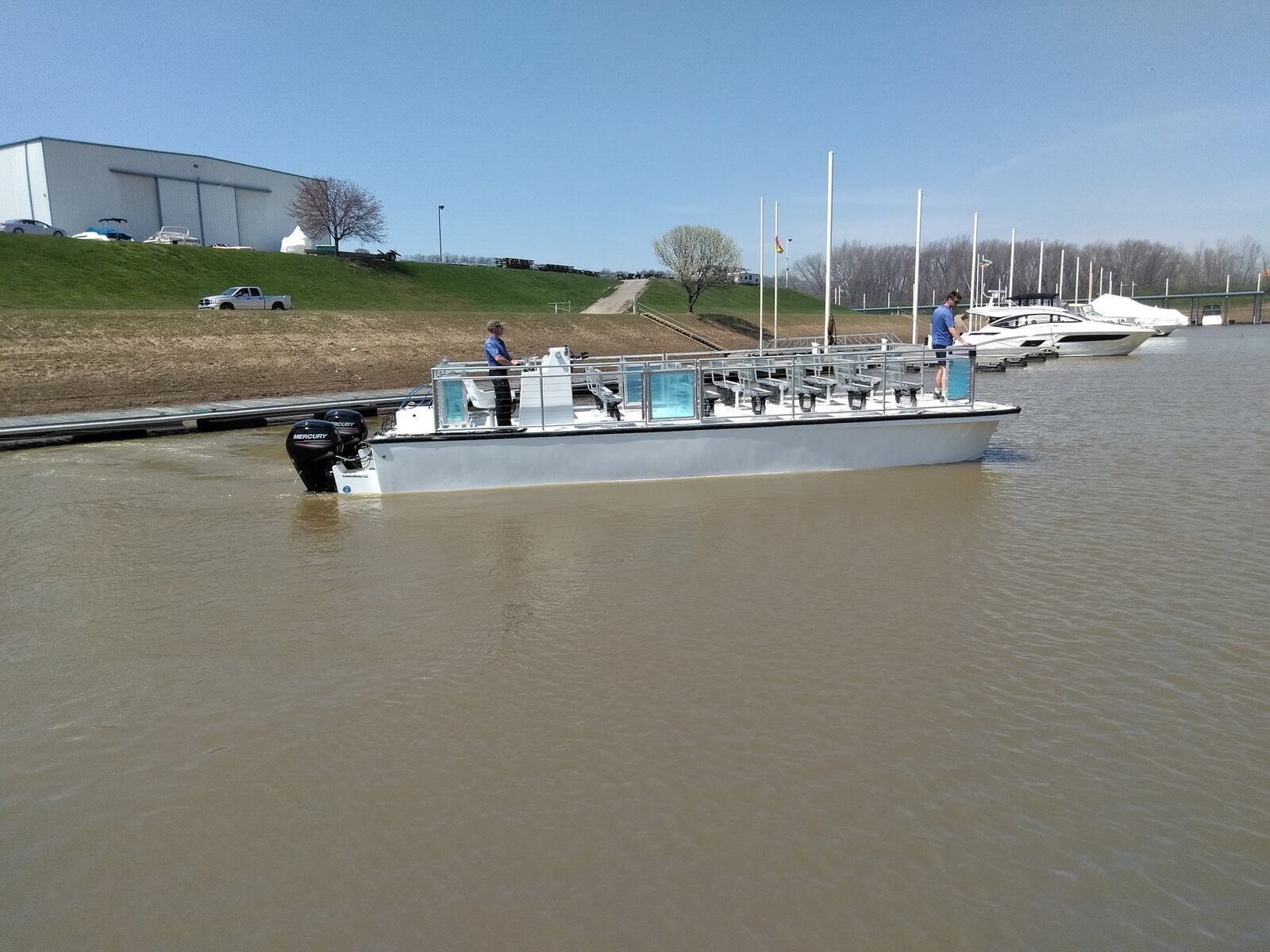 Water taxis manufactured by Hamilton’s Water Taxi Marine LLC undergo tests by the U.S. Coast Guard at an Ohio River marina before they can be sold. PROVIDED.