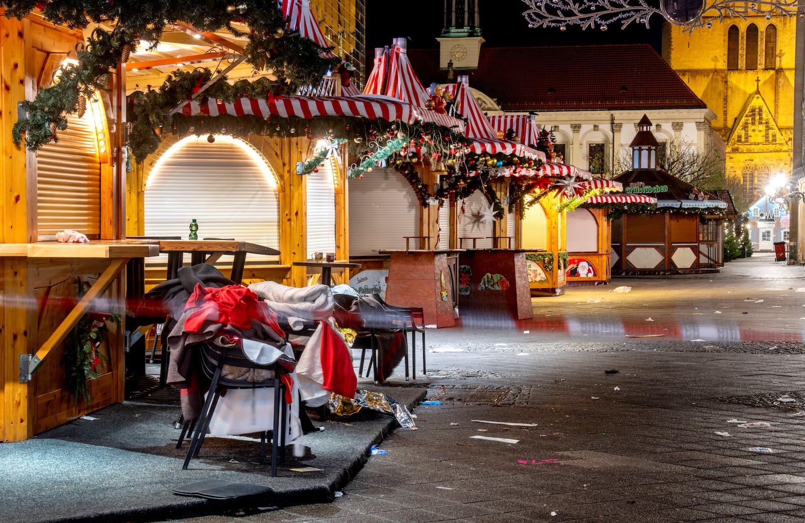 The Christmas market, where a car drove into a crowd on Friday evening, in Magdeburg, Germany, is empty on Sunday morning , Dec. 22, 2024. (AP Photo/Michael Probst)