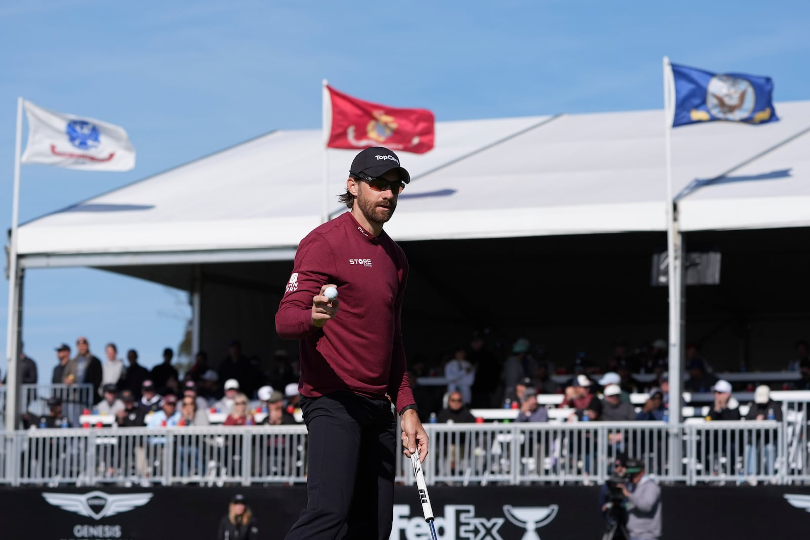 Patrick Rodgers reacts after finishing the 13th hole of the South Course at Torrey Pines during the third round of the Genesis Invitational golf tournament Saturday, Feb. 15, 2025, in San Diego. (AP Photo/Gregory Bull)