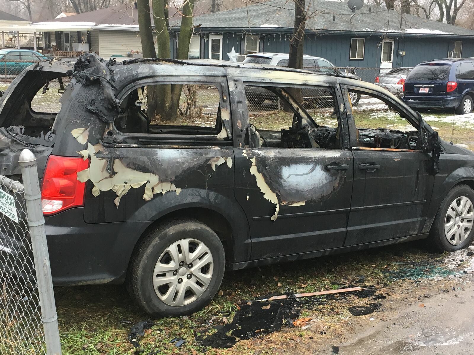 This 2016 Chrysler Town & Country van was destroyed Monday morning when two suspects allegedly threw an “incinerating device” at the vehicle that was parked in the 3000 block of Seneca Street. Eventually, two vans that belong to Ace 2 Taxi caught fire around 4:30 a.m. Monday, police said. RICK McCRABB/STAFF