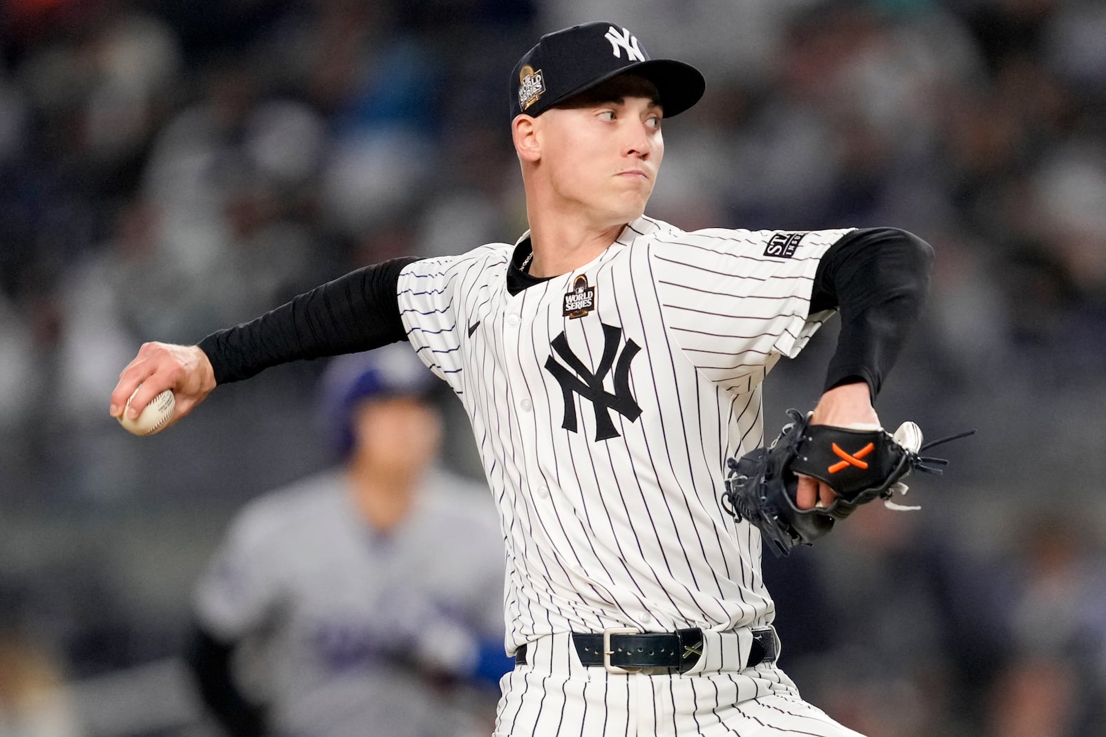 New York Yankees pitcher Luke Weaver throws against the Los Angeles Dodgers during the ninth inning in Game 3 of the baseball World Series, Monday, Oct. 28, 2024, in New York. (AP Photo/Ashley Landis)