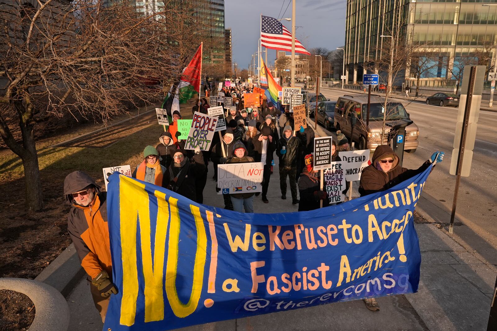 People march in protest against Project 2025, President Donald Trump, Elon Musk and other issues Wednesday, Feb. 5, 2025, in Cleveland. (AP Photo/Sue Ogrocki)