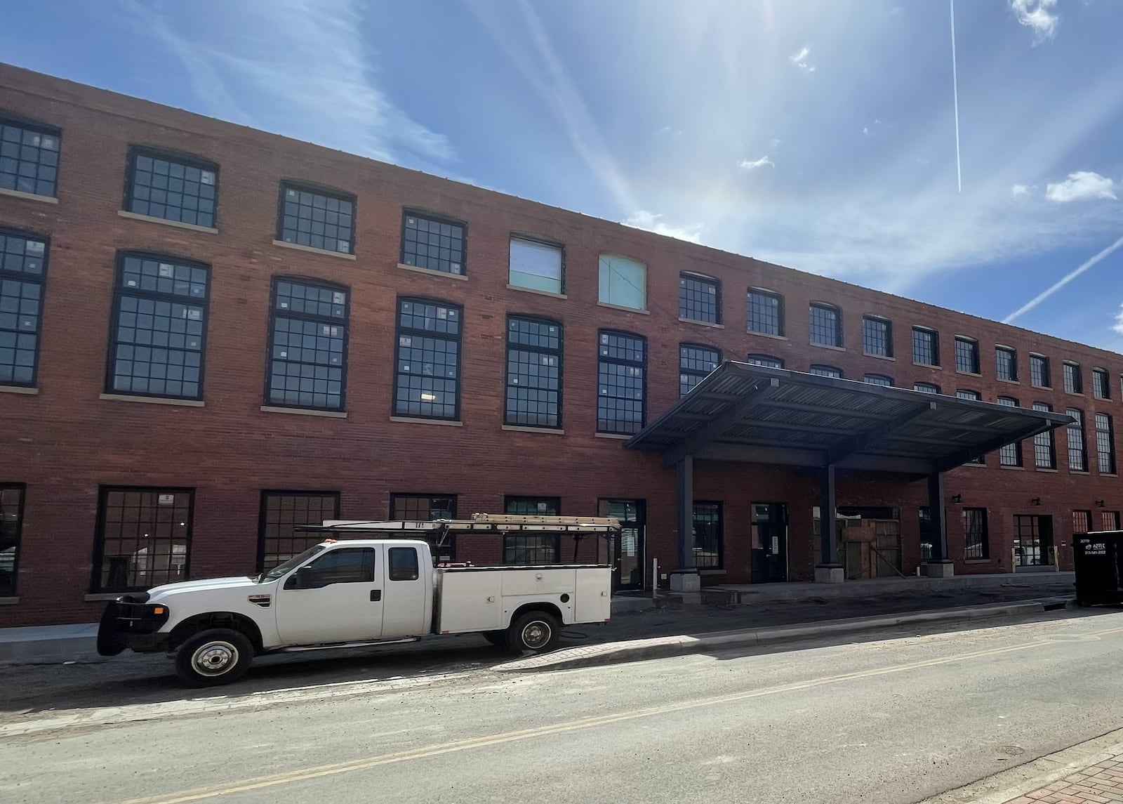 In this early 2022 photo, one of the canopies is seen on the Spooky Nook Sports Champion Mill building, at the entrance of the Warehouse Hotel. The canopy is one of two that had to come down. FILE