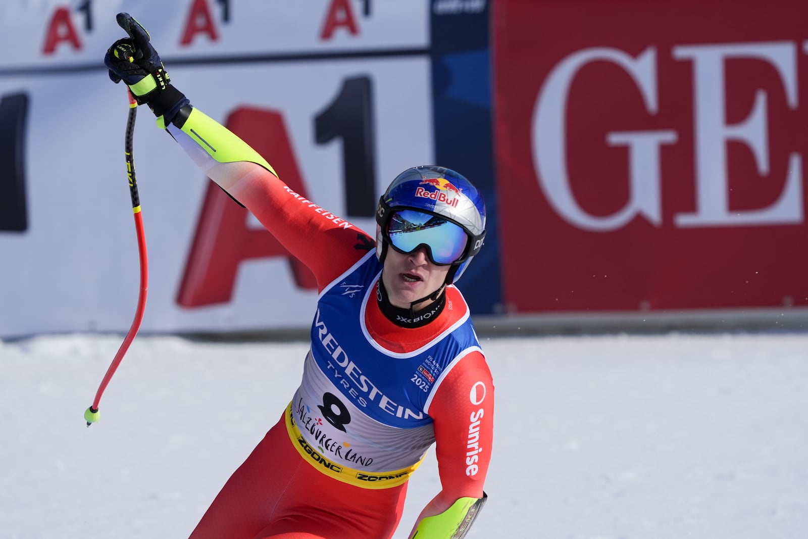 Switzerland's Marco Odermatt celebrates at the finish area of a men's Super-G, at the Alpine Ski World Championships, in Saalbach-Hinterglemm, Austria, Friday, Feb. 7, 2025. (AP Photo/Giovanni Auletta)