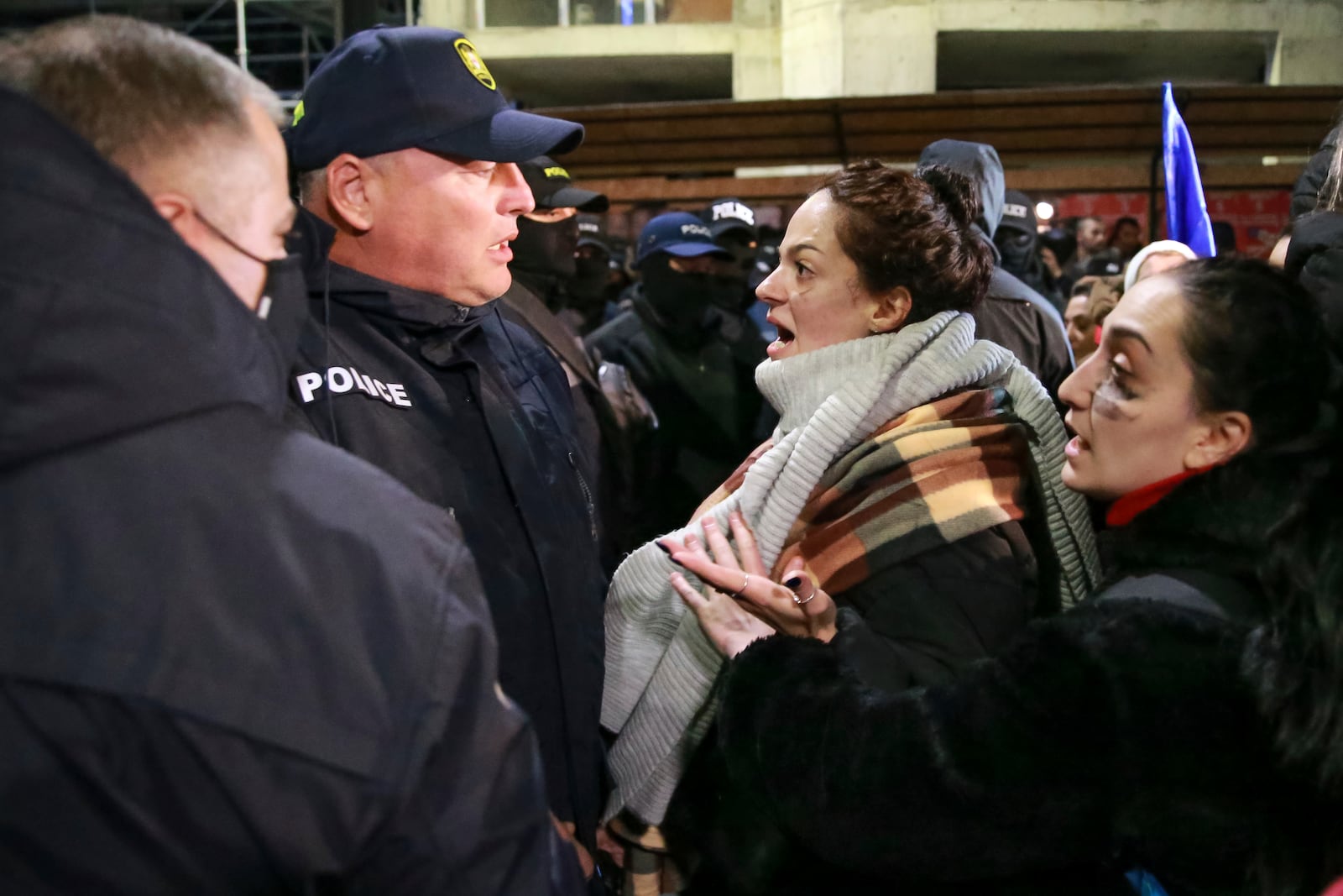 Women argue with police officers during a rally against the results of the parliamentary elections amid allegations that the vote was rigged in Tbilisi, Georgia Tuesday, Nov. 19, 2024. (AP Photo/Zurab Tsertsvadze)