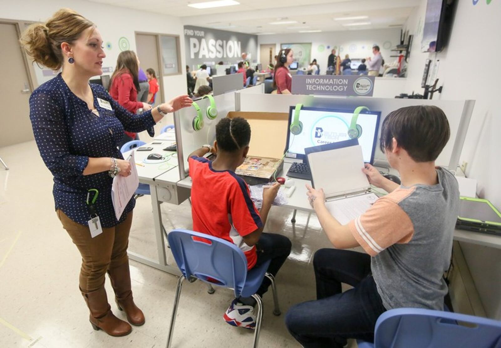 Eighth-grade students from Middletown Middle School explore the newly opened Butler Tech Career Lab, where students can try a series of virtual reality and hands-on career stations to help them decide on a career path. 